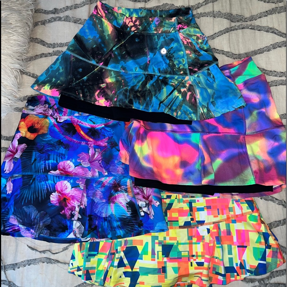 4 Donajo Brand multicolor tennis skirts.